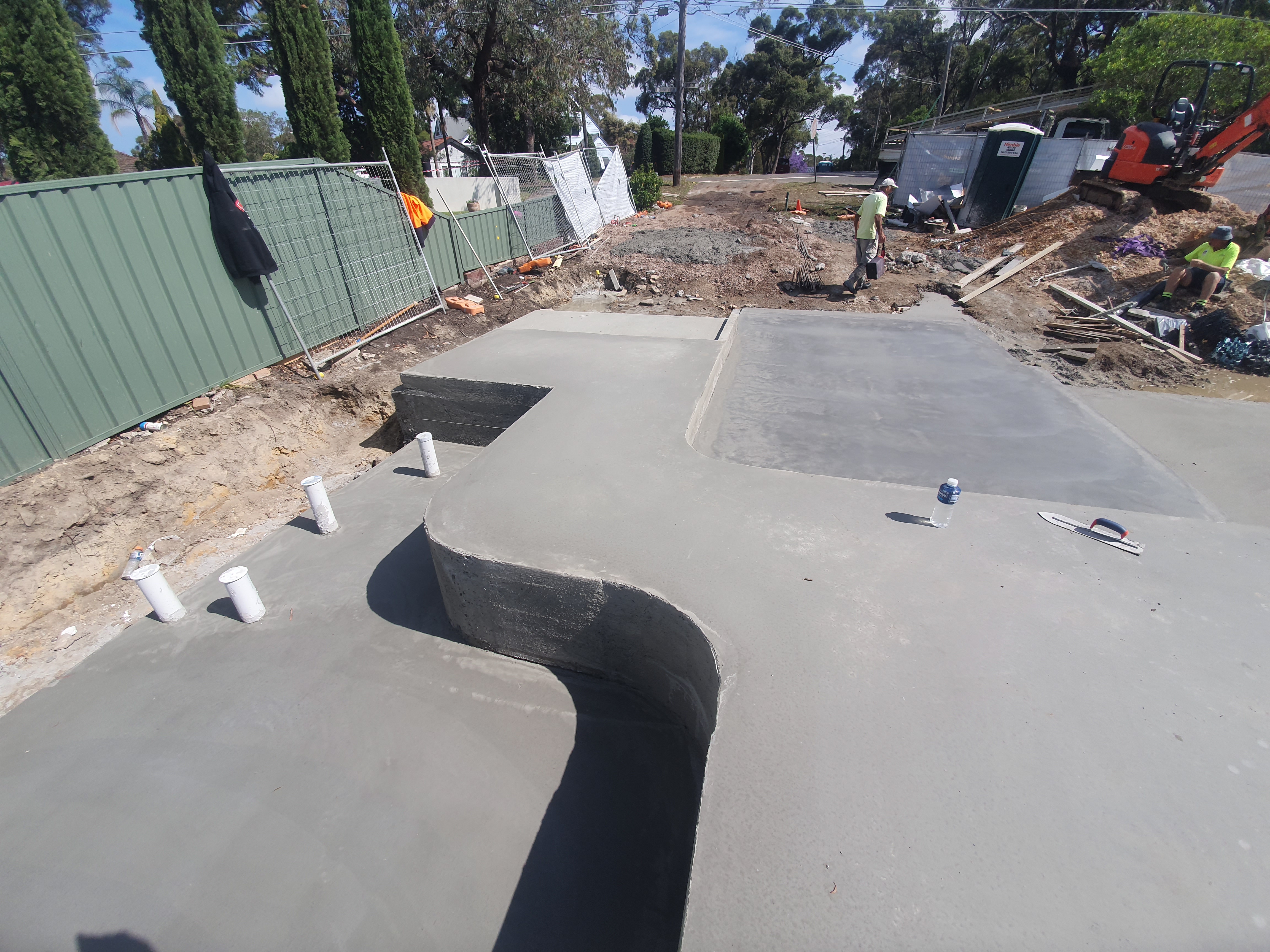 An image of a perfectly poured concrete slab with rounded edges, a job that could only be done with diligence, a Diligent Concrete Group project
